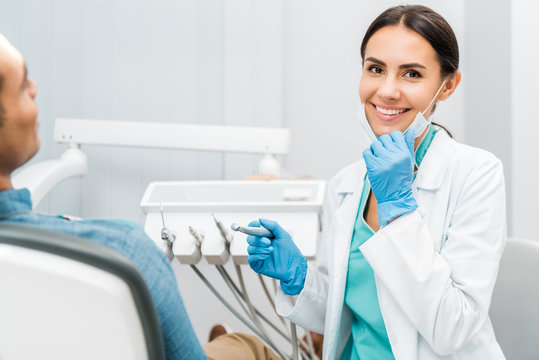 Dentist providing gentle care to a patient